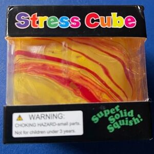 Yellow/Orange-ish Square Cube Striped Sensory Squish Stress Toy.